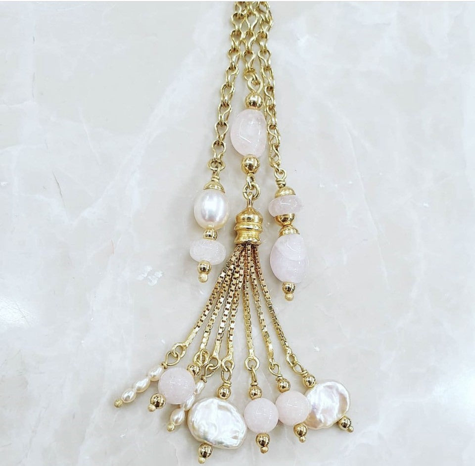 White and gold tassel