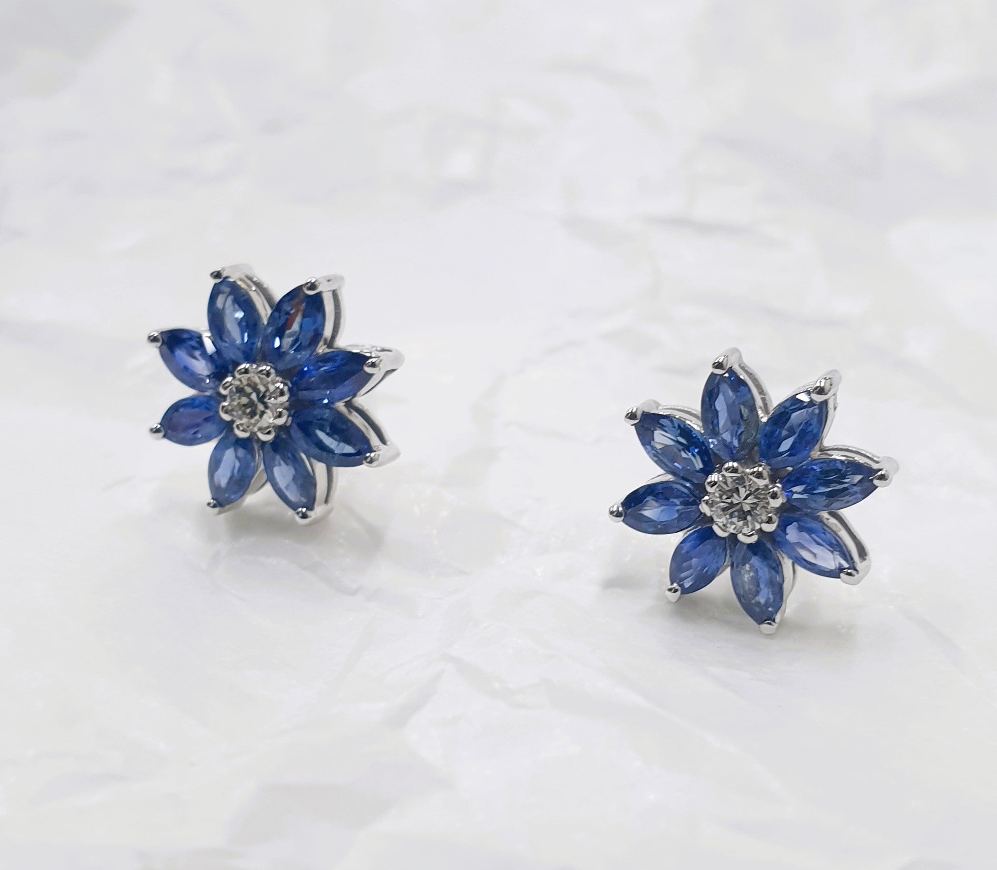 Classy flower seven blues sapphire in store sliver earring